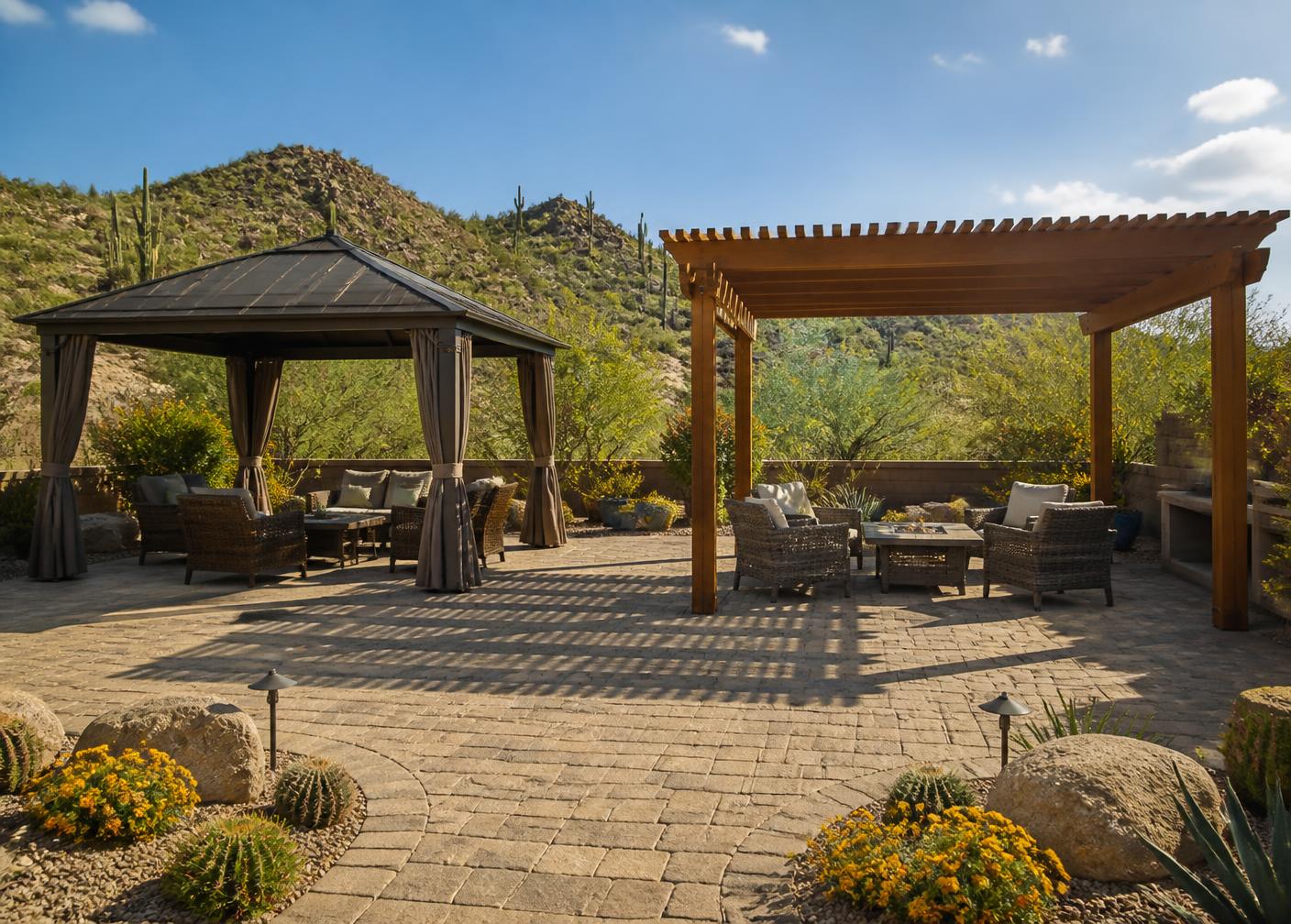 Side by side comparison of a solid roof gazebo and an open slatted wood pergola on a paver patio in a desert backyard